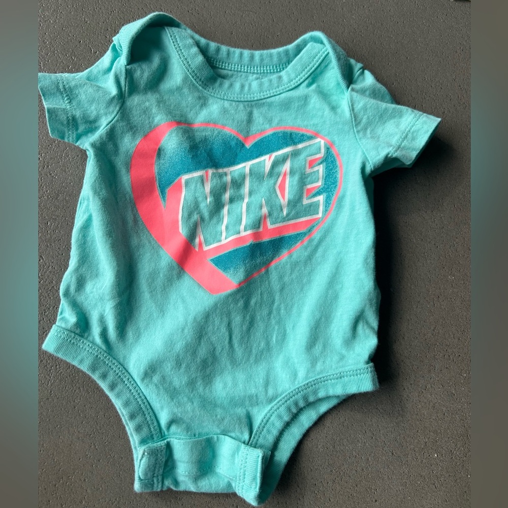 Nike Kids One-Piece Bodysuit in Teal with Pink Logo